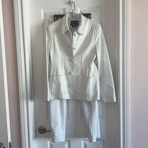 White leather jacket and pants.